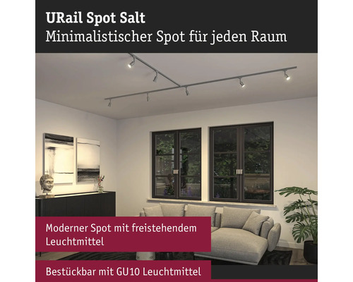 URail Spot Salt Schienensystem mit mehreren Strahlern in einem Wohnzimmer.