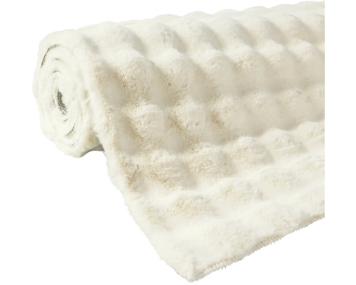 Gerollter Teppich mit Noppenstruktur