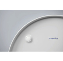 Detailansicht eines runden Keramikwaschbeckens mit Duravit Logo und Abflussstopfen