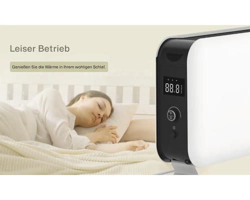 Szene mit einer schlafenden Person im Bett neben einem Heizgerät