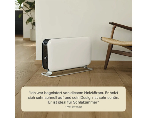 Heizkörper im Wohnraum neben einem Stuhl