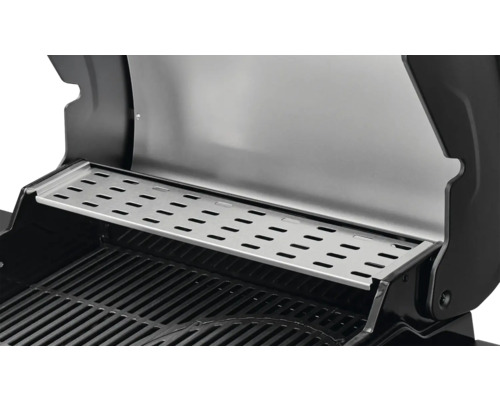 Detailaufnahme eines Grillrosts mit Warmhalterost