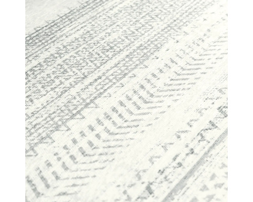 Detailansicht eines Teppichs mit geometrischem Muster