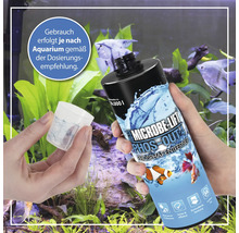 Microbe Lift Phos Out 4 Phosphatentferner Flasche mit Messbecher vor Aquarium