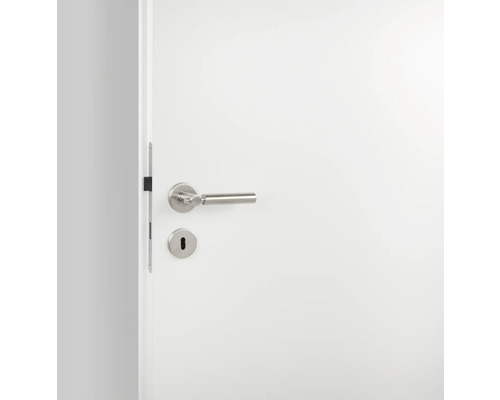 Weiße Innentür mit Drückergarnitur aus Metall