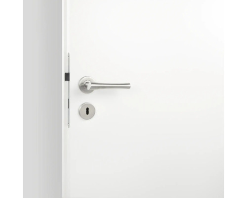 Weiße Tür mit silberfarbener Türklinke und Schlüsselloch