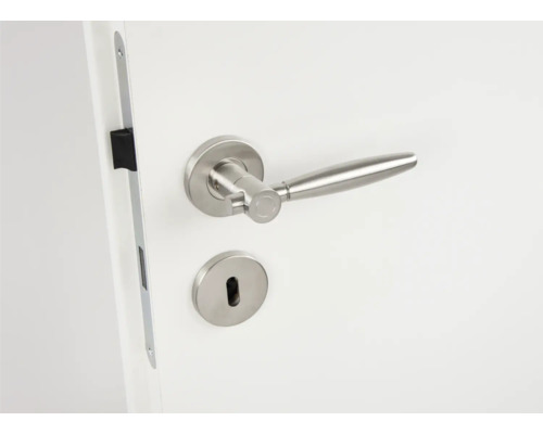 Edelstahl Türbeschlag mit Schloss auf weißer Tür