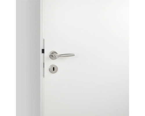 Weiße Innentür mit Türgriff und Schlüsselloch