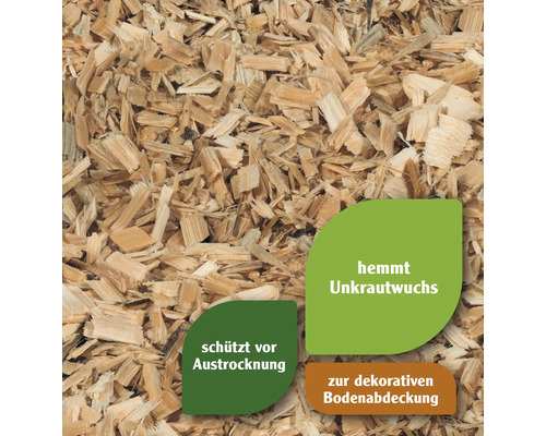 Nahaufnahme von Holzhackschnitzeln zur dekorativen Bodenabdeckung und Unkrauthemmung