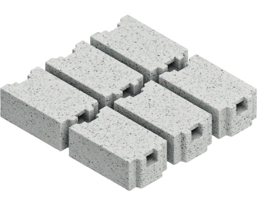 Mehrere Betonsteine mit Nut- und Federverbindung