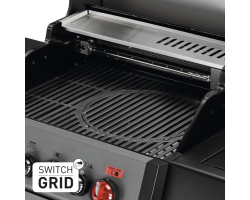 Innenansicht eines Grills mit Warmhalterost und Grillrost