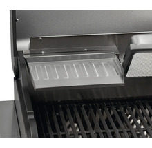 Detailaufnahme eines Grillrosts mit Warmhalterost