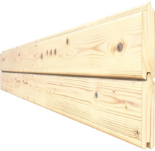 Zwei Nut- und Federbretter aus Holz im Detail