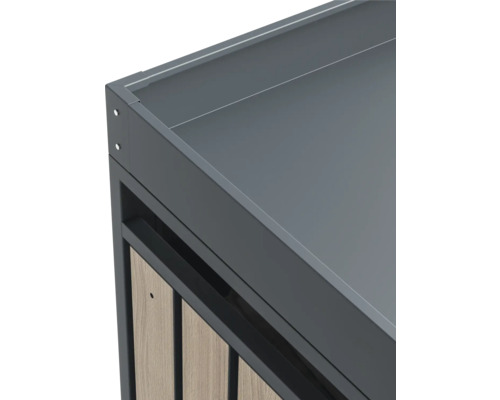 Detailansicht eines grauen Möbelstücks mit Holzverkleidung