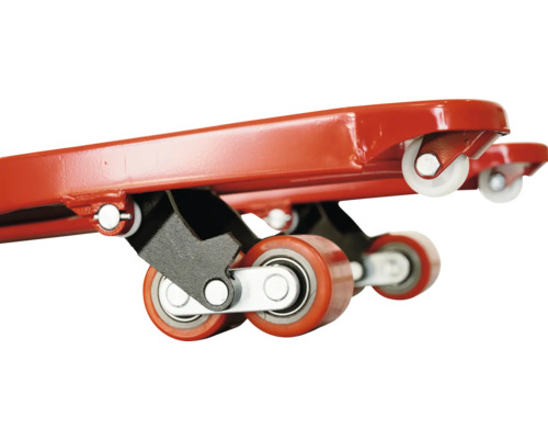 Detailansicht einer Möbelrolle mit roten und weißen Rädern.