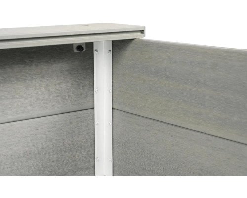 Detailansicht eines Hochbeets mit Holzstruktur und weißem Eckverbinder.