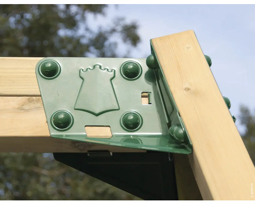 Detailansicht eines Spielturm-Verbindungsstücks aus Metall mit Burgmotiv und Holz