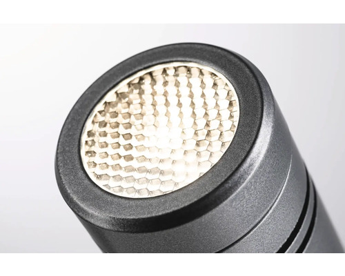 Nahaufnahme einer schwarzen Lampe mit Wabenmuster