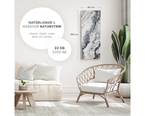 Wohnzimmer mit Natursteinheizung, Sessel und Couch