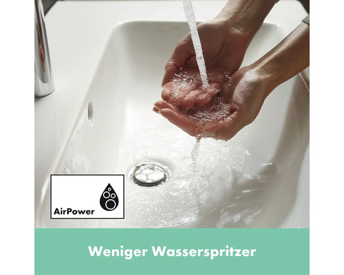 Hände unter fließendem Wasser in einem Waschbecken mit AirPower Funktion