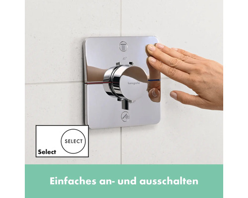 Hansgrohe Logo auf einer Aufputz Duscharmatur mit Select Funktion und Hand
