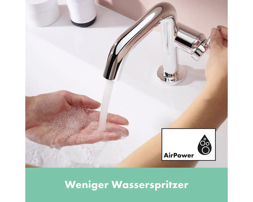 Glänzende Armatur mit fließendem Wasser und AirPower Symbol
