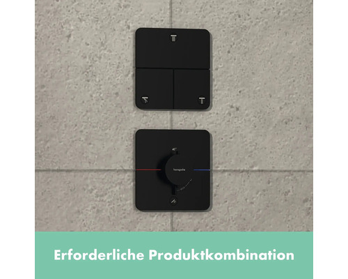 Schwarze Unterputzarmatur mit mehreren Bedienelementen an der Wand