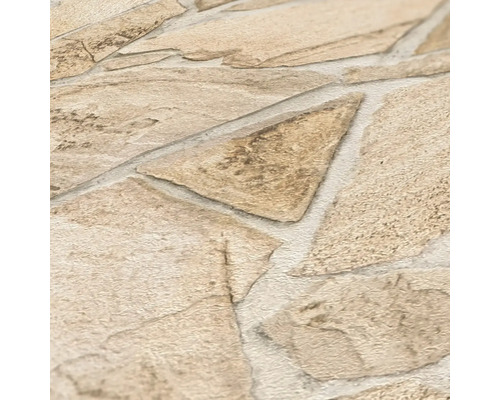 Nahaufnahme einer Steintapete mit unregelmäßig geformten Steinen.