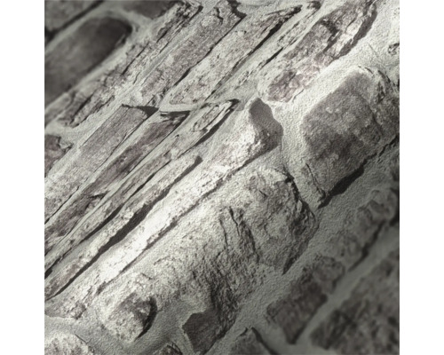 Nahaufnahme einer Tapete mit Steinoptik.