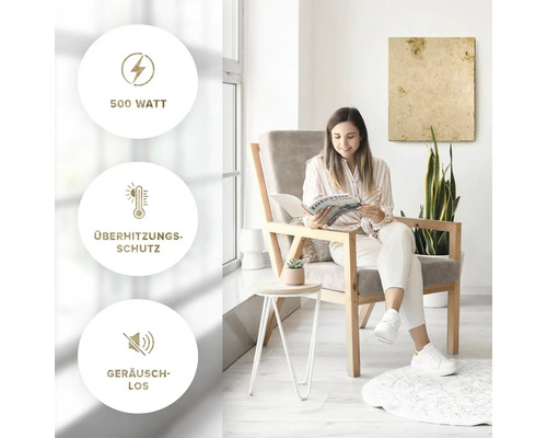 Frau liest in einem hellen Raum mit Hinweisen auf 500 Watt Leistung, Überhitzungsschutz und geräuschlosen Betrieb