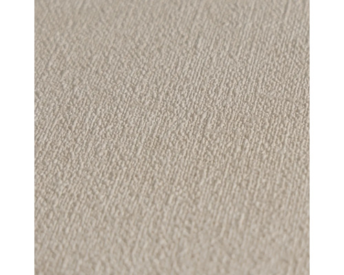 Nahaufnahme einer beigen Rauhfasertapete