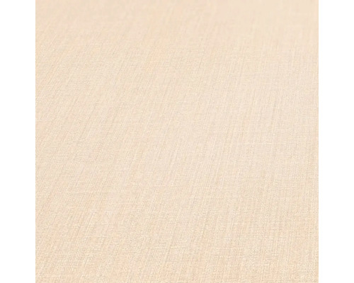 Nahaufnahme einer beigen Tapete mit leichter Textur