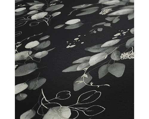 Nahaufnahme einer dunklen Oberfläche mit Blattmuster