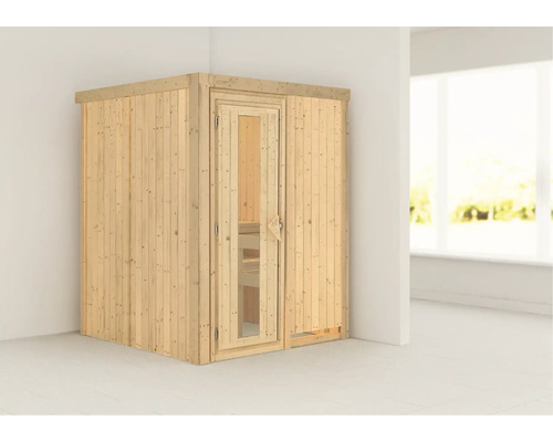 Holzsauna mit Glastür in einem hellen Raum