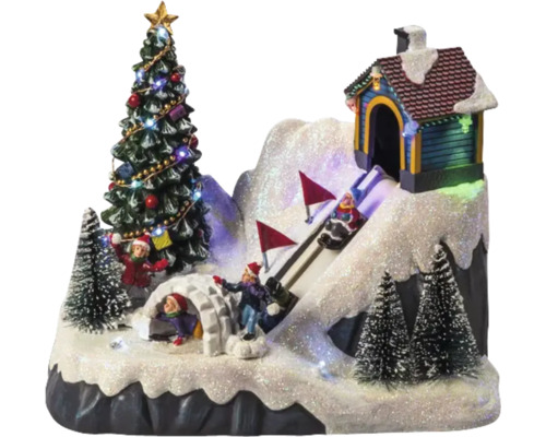 Dekorative Winterlandschaft mit Weihnachtsbaum, Iglu, Haus und Skifahrern