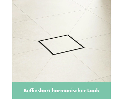 Befliesbare Duschrinne mit dunklem Rahmen in Badezimmerfliesen