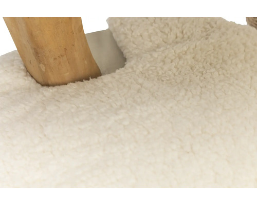 Detailansicht eines Hockers mit Holzbein und Fellbezug