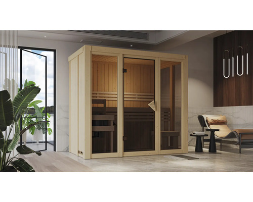 Sauna aus Holz mit Glastür in einem modern eingerichteten Raum.