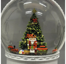 Schneekugel mit Nussknacker, Weihnachtsbaum und Spielzeugeisenbahn