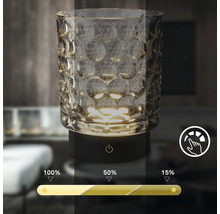 Dekorative Tischleuchte aus Glas mit Touch-Funktion zur Dimmbarkeit.