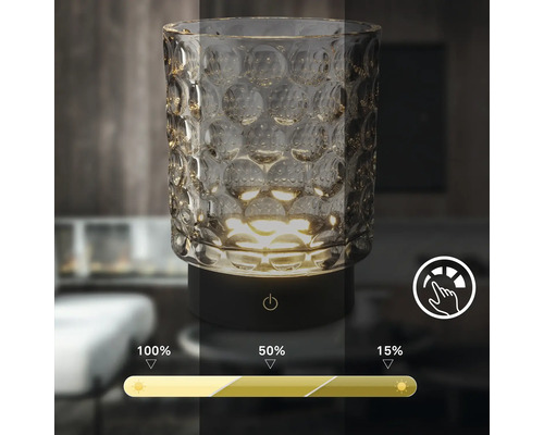 Dekorative Tischleuchte aus Glas mit Touch-Funktion zur Dimmbarkeit.