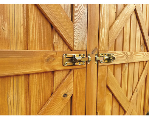 Detailansicht einer Holztür mit zwei Riegeln