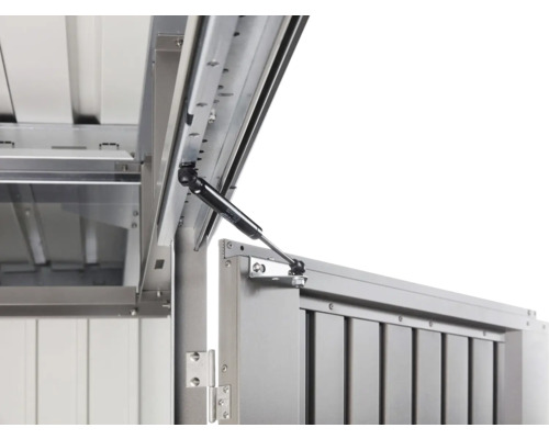 Detailansicht eines geöffneten Metallschranks mit Gasdruckfeder