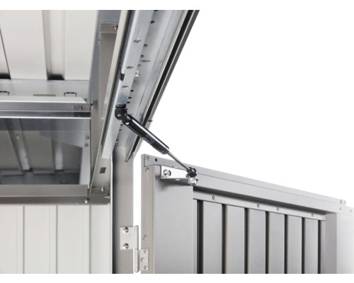 Detailansicht einer Gerätebox mit Gasdruckfeder zur Deckelunterstützung.