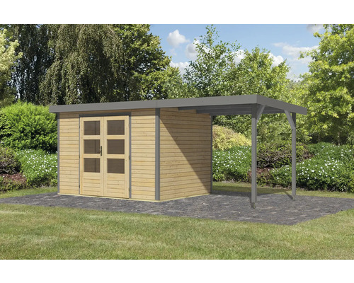 Gartenhaus mit Anbau auf Rasenfläche vor Bäumen