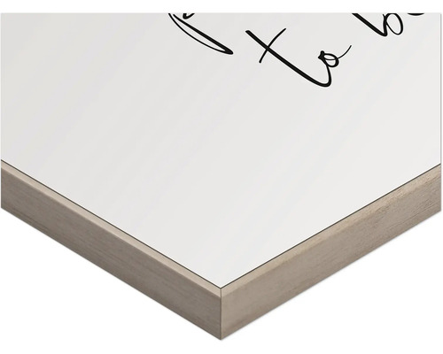 Detailansicht eines gerahmten Bildes mit Schriftzug