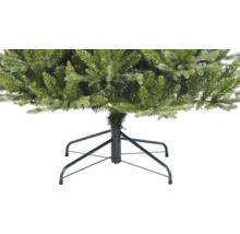 Detailaufnahme eines künstlichen Weihnachtsbaums mit Metallfuß
