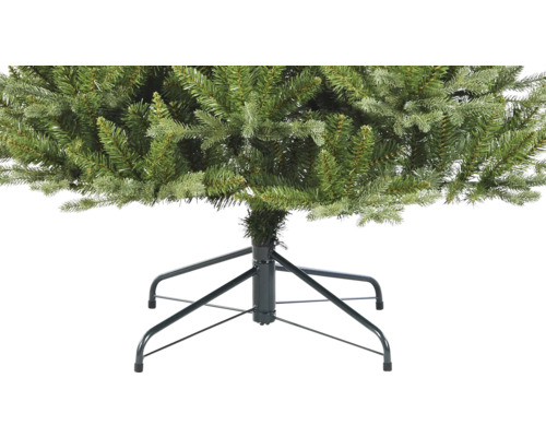 Detailaufnahme eines künstlichen Weihnachtsbaums mit Metallfuß