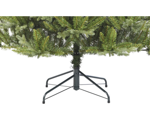 Detailansicht eines künstlichen Weihnachtsbaums mit Metallfuß