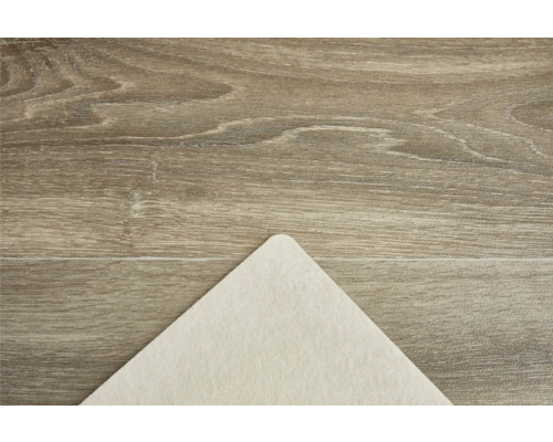 Detailansicht einer Holzfußbodenoberfläche mit einer hellen Filzunterlage